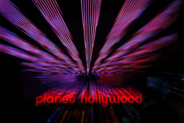 Photography zoom burst technique - beautiful Las Vegas city lights and Planet Hollywood